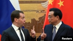 Дмитрий Медведев и премьер Госсовета Китая Ли Кэцян 