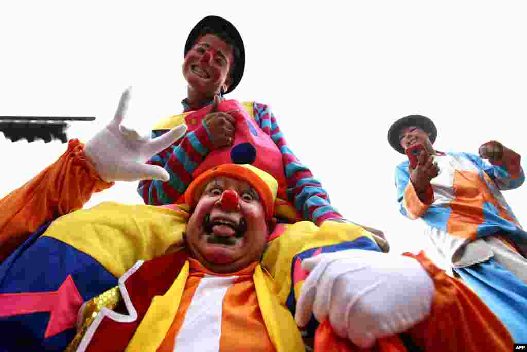 Clowns pose for a picture during the International Clown Day in Guadalajara, Mexico, Dec. 10, 2019.