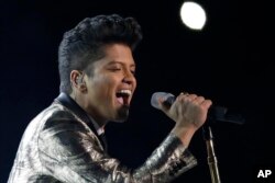 Bruno Mars performs during the halftime show of the NFL Super Bowl XLVIII football game, Feb. 2, 2014, in East Rutherford, N.J.