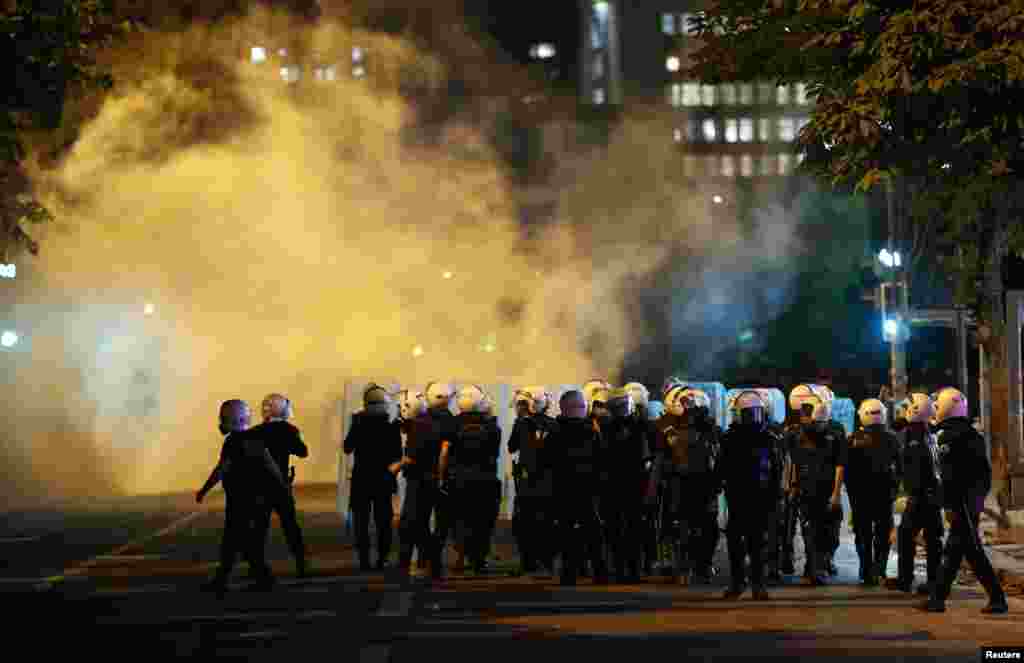 Riot police clash with anti-government protesters in Ankara, Turkey, June 3, 2013. 