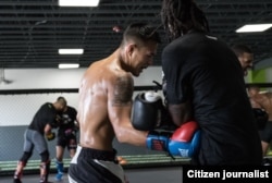 Andre Soukhamthath, a Lao-American UFC fighter in training.