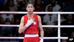 Lin Yu-ting bereaksi setelah mengalahkan petinju Uzbekistan Sitora Turdibekova dalam pertandingan pendahuluan tinju putri kelas 57 kg di Olimpiade Musim Panas 2024, Jumat, 2 Agustus 2024, di Paris, Prancis. (Foto: AP)