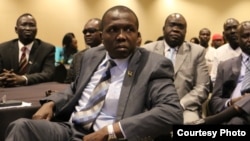 David Mayen Dengdit, center, the now-resigned press secretary for South Sudan's Vice President James Wani Igga, attends a meeting in this undated photo. (Photo courtesy of David Mayen Dengdit)