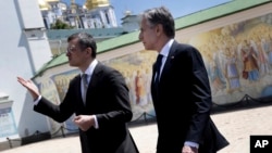 (FILE) U.S. Secretary of State Antony Blinken, right, and Ukraine's Foreign Minister Dmytro Kuleba in Kyiv on Wednesday, May 15, 2024. 