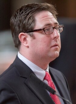 FILE - Nebraska Speaker of the Legislature Sen. Mike Flood of Norfolk follows debate in the legislature, April 18, 2012.
