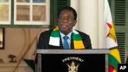 Zimbabwean President Emmerson Mnangagwa addresses a press conference at State House in Harare, Sunday, Aug. 27 2023. Authorities in Zimbabwe say President Emmerson Mnangagwa has been re-elected for a second and final term. 