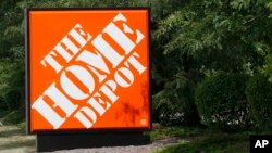 FILE - The sign showing the location of the Home Depot store in Cranberry, Pa.