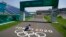 A worker paints Olympic rings at the finish line of the BMX racing track as preparations continue for the 2020 Summer Olympics, Tuesday, July 20, 2021, at the Ariake Urban Sports Park in Tokyo. (AP Photo/Charlie Riedel)