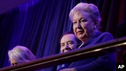 FILE - In this Nov. 9, 2016 file photo, federal judge Maryanne Trump Barry, older sister of Donald Trump, sits in the balcony during Trump's election night rally in New York.