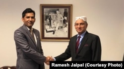 Ramesh Jaipal of Pakistan, who was sold into slavery as a child but later studied at American University's College of Law, meets with the Pakistani Ambassador in Washington, D.C.