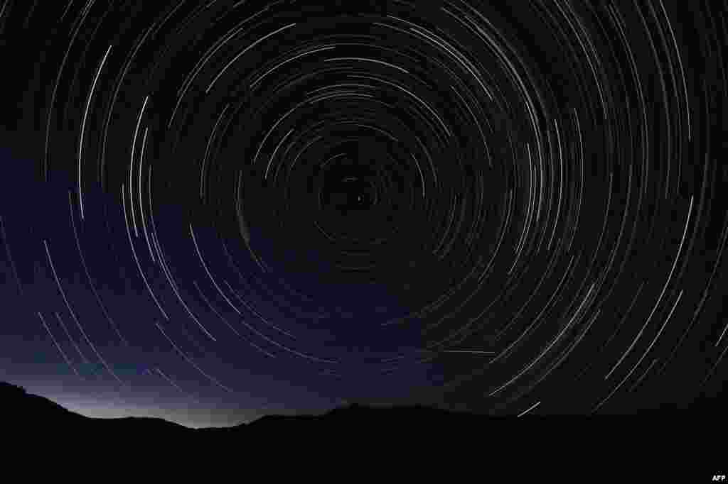 A multiple exposure picture shows a Perseids meteor shower in the sky, near the municipality of La Hiruela, on the mountains of the Sierra Norte de Madrid, Spain, August 11, 2013.