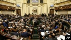 FILE - Egypt's Parliament meets to deliberate over constitutional amendments that could allow President Abdel-Fattah el-Sissi to stay in office until 2030, in Cairo, Egypt, Feb 13, 2019. 