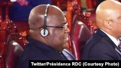 Président Félix Tshisekedi (gauche) na bokutani ya mobu na mobu ya bakambi ya Banque africiane ya développement (BAD) na Malabo, Guinée équatoriale, 12 juin 2019. (Twitter/Présidence RDC)