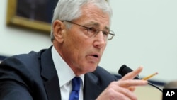 FILE - Defense Secretary Chuck Hagel testifies before the House Armed Services Committee on Capitol Hill in Washington, D.C.