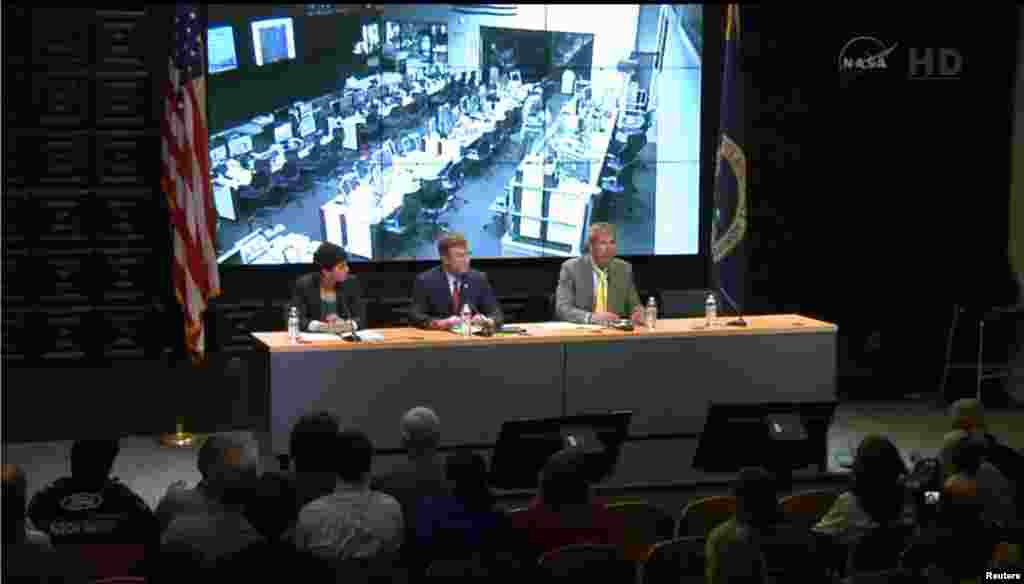Rachel Kraft, NASA spokewoman, Frank Culbertson, Executive Vice President and General Manager of Advanced Programs Group at Orbital Sciences Corp., and Bill Wrobel, director of NASA&#39;s Wallops Flight Facility, speak at a news conference in this still image from NASA TV at Wallops Flight Facility, Virginia, Oct. 28, 2014. 