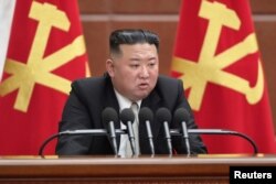 North Korean leader Kim Jong Un attends the sixth enlarged meeting of the eighth Central Committee of the Workers' Party in Pyongyang, North Korea. (Undated photo from the Korean Central News Agency via Reuters)