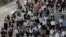 Protesters march during a flash mob protest in Hong Kong, Oct. 11, 2019.