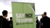 FILE—Participants talk before the start of the World Anti-Doping Agency (WADA) Symposium for Anti-Doping Organizations in Lausanne March 24, 2015.