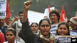 Activists of the communist Party of India (Marxist-Leninist) Liberation (CPIML) shout anti-government slogans during a protest in New Delhi, December 29, 2011.