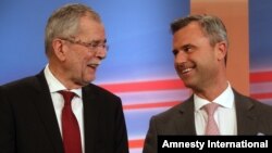 FILE - Norbert Hofer, right, candidate of Austria's Freedom Party, FPOE, talks to Alexander Van der Bellen (L) candidate of the Austrian Greens during the release of the first election results of the Austria presidential elections in Vienna, Austria, April 24, 2016. 