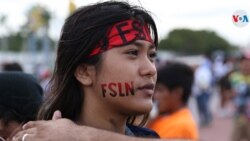 Una simpatizante de Daniel Ortega durante un acto en Managua el 19 de julio de 2021. Foto Houston Castillo, VOA.