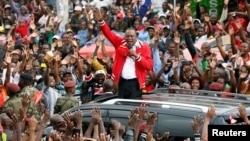 FILE - Kenya's President Uhuru Kenyatta addresses a Jubilee Party campaign rally in Nairobi, Kenya, Oct. 23, 2017.