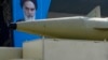 Iran unveils new ballistic missile, upgraded attack drone