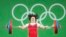 FILE - Choe Hyo Sim of North Korea competes in the weightlifting finals in the Olympics in Rio de Janeiro, Brazil, Sept. 8, 2016.