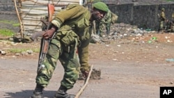 A Congolese soldier at the last army check point in Munigi, near Goma in the DRC on Nov. 19, 2012. 