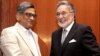 Indian Foreign Minister S.M. Krishna, right, shakes hand with his Afghan counterpart Zalmai Rassoul during a joint press conference in New Delhi, India, May 1, 2012. 