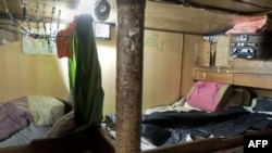 A shared bedroom in one of the seven rusted Taiwanese-registered fishing boats where 75 Indonesian fishermen have been living at Cape Town Harbor, Nov, 28, 2013. 