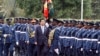 Japan's Prime Minister Shinzo Abe inspects a military honor guard in Nairobi, Kenya, where he's visiting as part of an international development conference, Aug. 26, 2016.