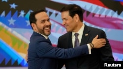 Colombian President Abelardo De La Espriella and U.S. Secretary of State Marco Rubio embrace during a bilateral agreements signing ceremony in Barranquilla, Colombia, September 8, 2026.