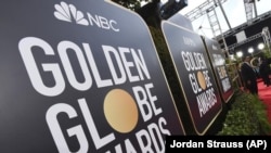 FILE - Signage promoting the 77th annual Golden Globe Awards and NBC appears in Beverly Hills, Calif. on Jan. 5, 2020. NBC said Monday that will not air the Golden Globes in 2022. (Photo by Jordan Strauss/Invision/AP, File)