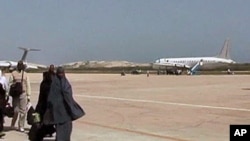 The presence of armed peacekeepers allows the few commercial planes that fly to Mogadishu to bring Somalis in and out of the capital and connect them to the rest of the world