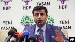 FILE - Pro-Kurdish Peoples' Democracy Party leader Selahattin Demirtas is seen speaking during a news conference in Ankara, Turkey, July 21, 2015.