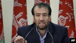 Election commission Chairman Fazel Ahmad Manawi speaks during the announcement of the final election results in Kabul, Afghanistan on Dec 1, 2010.