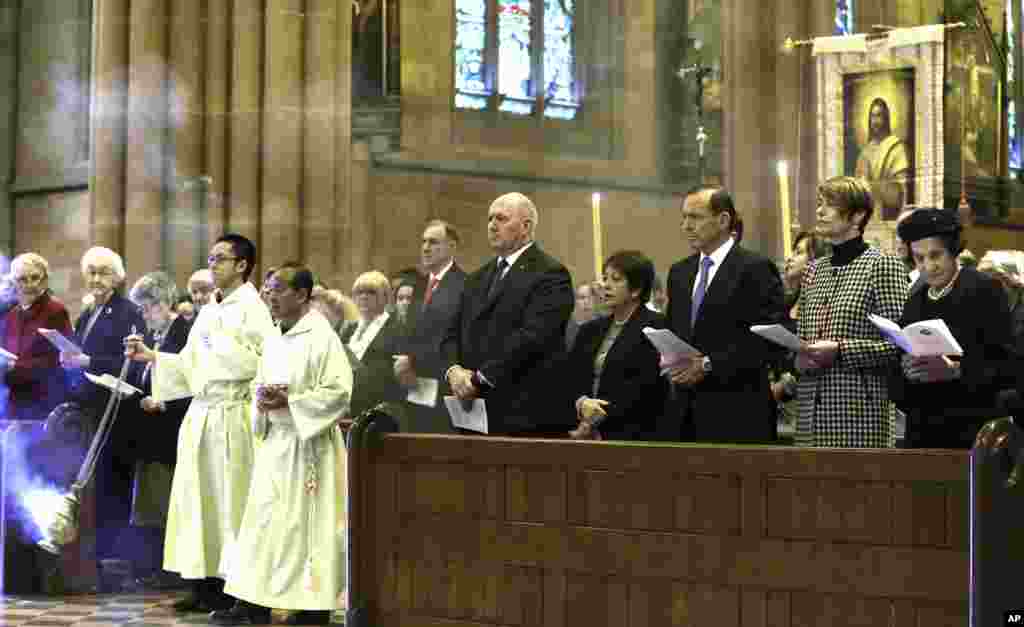 From right: New South Wales Governor Marie Bashir, Margie Abbott, Australia&#39;s Prime Minister Tony Abbott, Lady Lynne Cosgrove and Governor General Sir Peter Cosgrove attend a mass at St. Mary&#39;s Cathedral commemorating victims of Malaysia Airlines Flight 17, in Sydney, Australia, July 20, 2014.