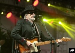 FILE - Merle Haggard performs at the 2015 Big Barrel Country Music Festival in Dover, Del., June 28, 2015.