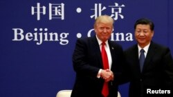 2017年11月9日，美国总统特朗普和中国国家主席习近平在北京人民大会堂会见商界领袖。