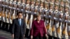 Merkel Urges China to Resolve Maritime Dispute With US