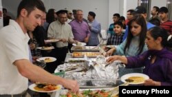 Muslims, Christians, Jews, Quakers, Buddhists, and Sikhs shared an iftar dinner during the holiest time in the Islamic calendar, at the Bait-ur-Rehman Mosque in Silver Spring, Maryland, June 15, 2017. The meal consisted of traditional Pakistani dishes. (Courtesy - Bait-ur-Rehman Mosque)