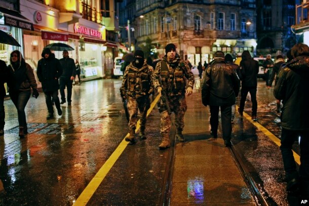 Turkish police patrol in central Istanbul's Istiklal Avenue, Dec. 31, 2016.