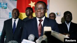 FILE - Maurice Kamto, a presidential candidate of Renaissance Movement (MRC), holds a news conference at his headquarter in Yaounde, Cameroon, Oct. 8, 2018.
