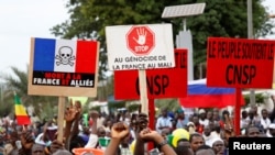 Opposition supporters attend a rally to celebrate the ousting of President Ibrahim Boubacar Keita, at the Independence Square in Bamako, Mali, Aug. 21, 2020.