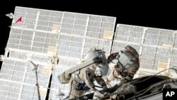 Russian cosmonauts replace old batteries outside the International Space Station, June 2, 2021.