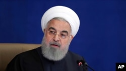 President Hassan Rouhani, speaking in a meeting in Tehran, Iran, Dec. 9, 2020, said U.S. sanctions are making it difficult for Iran to purchase medicine and health supplies from abroad, including COVID-19 vaccines needed to contain the worst outbreak.