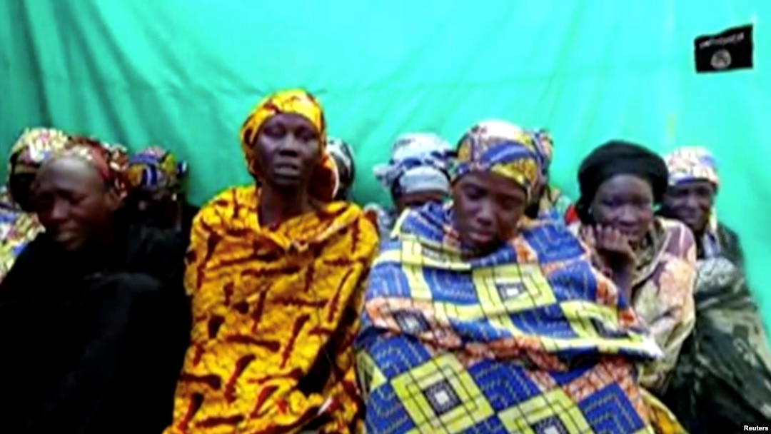 Remaining girls who were kidnapped from the northeast Nigerian town of Chibok are seen in an unknown location in Nigeria in this still image taken from an undated video obtained on Jan. 15, 2018. 