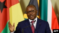 FILE — Guinea-Bissau's President Umaro Sissoco Embalo conducts a press conference during his state visit to South Africa at the Union Buildings in Pretoria, April 28, 2022. 