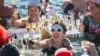 Revelers take part in a New Year's day swim in Lake Geneva with its 7.3 degree celsius waters in Geneva, Switzerland, Jan. 1, 2025.